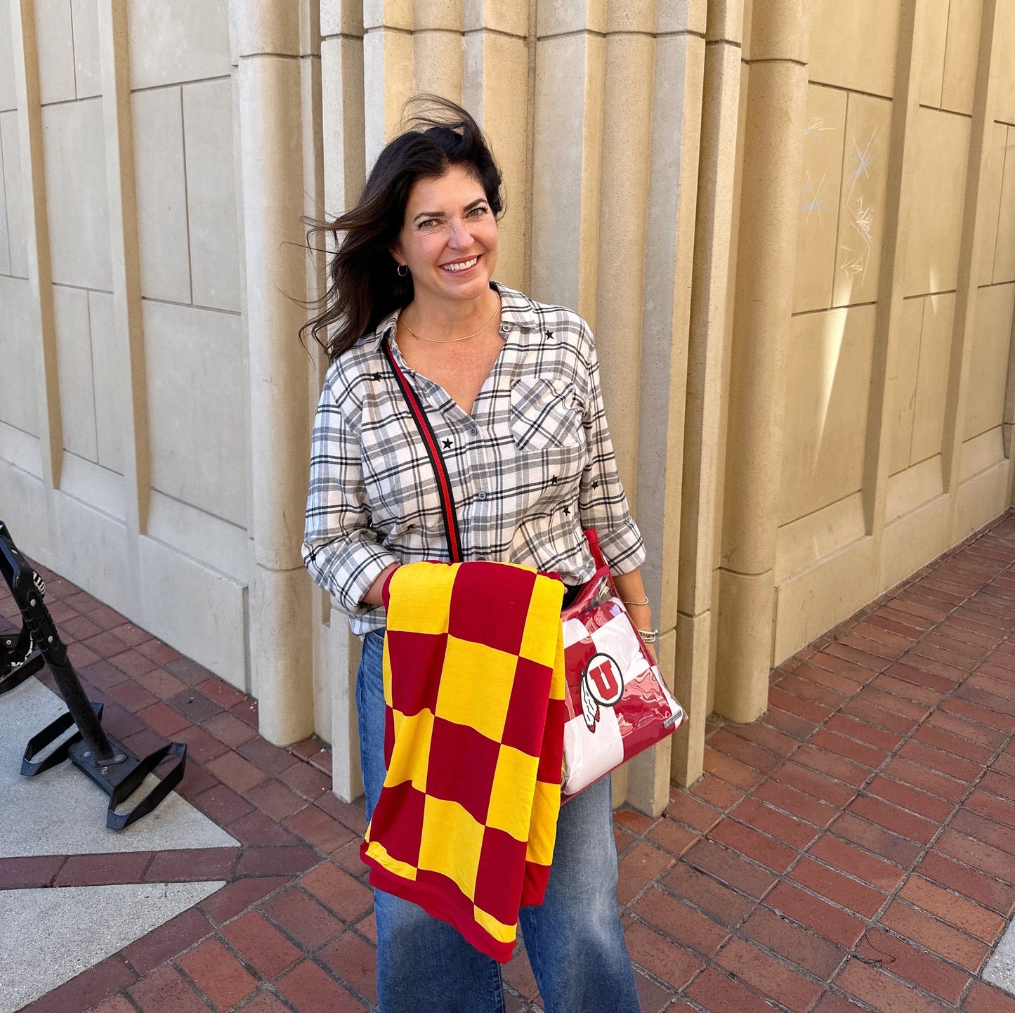 Stadium approved game day hug blanket that is easy to pack to all the games!