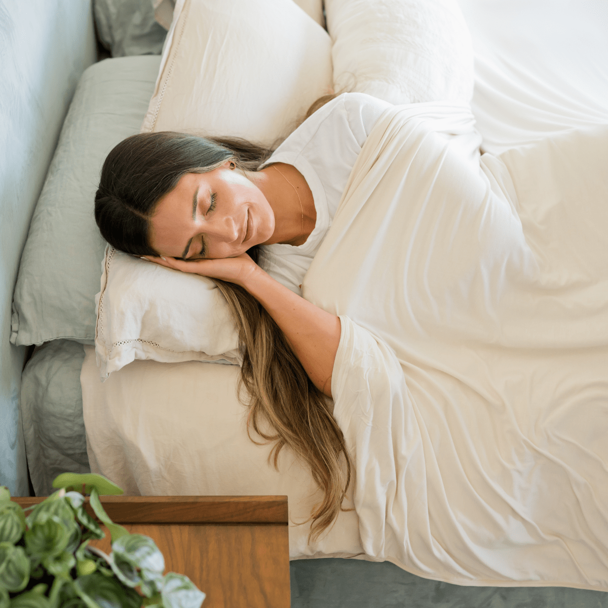 Sleep better with temperature regulating bed sheets / blankets.