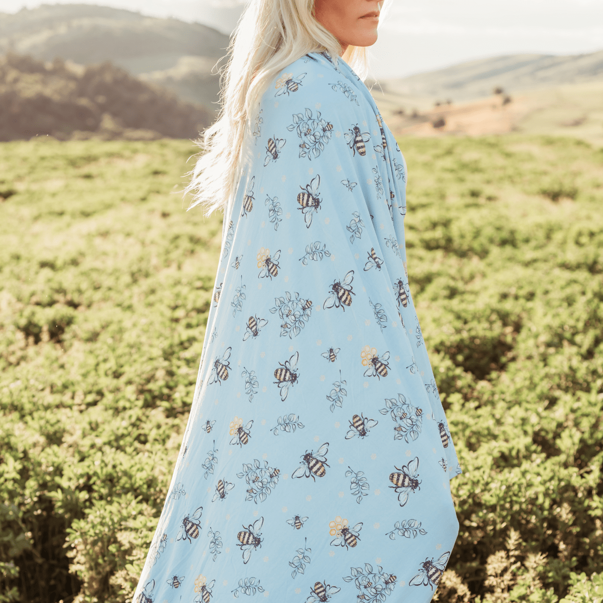 Calm stress and anxiety with our four way stretch adult swaddle blankets, this one is in a bee pattern