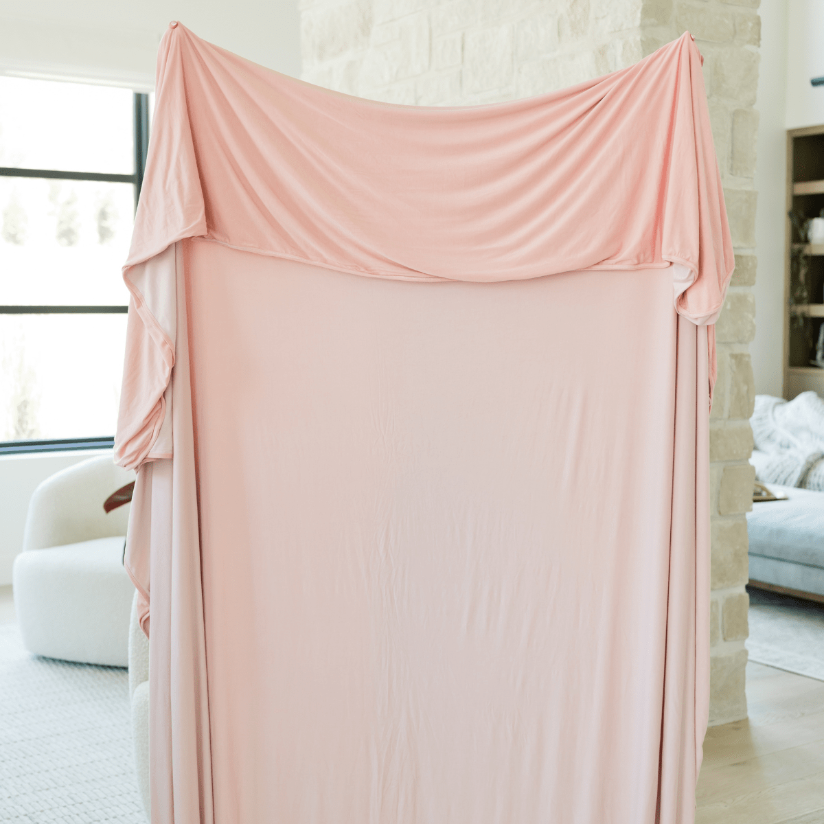 2 sided, double layered blush pink bed blanket. One shade darker on the back side making them the perfect reversible blanket for matching decor.