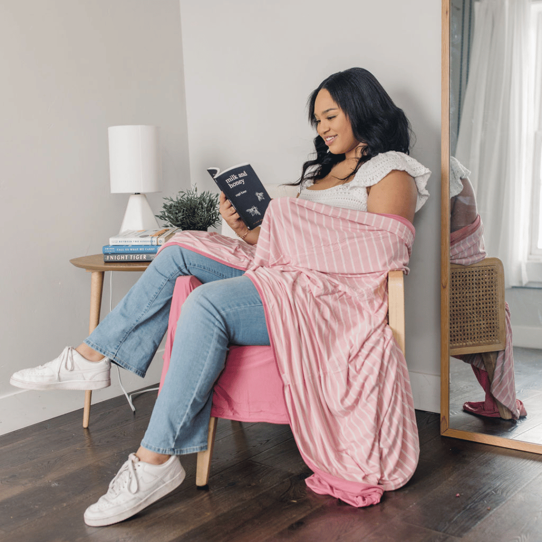 Pink striped decorative throw with cooling fabric