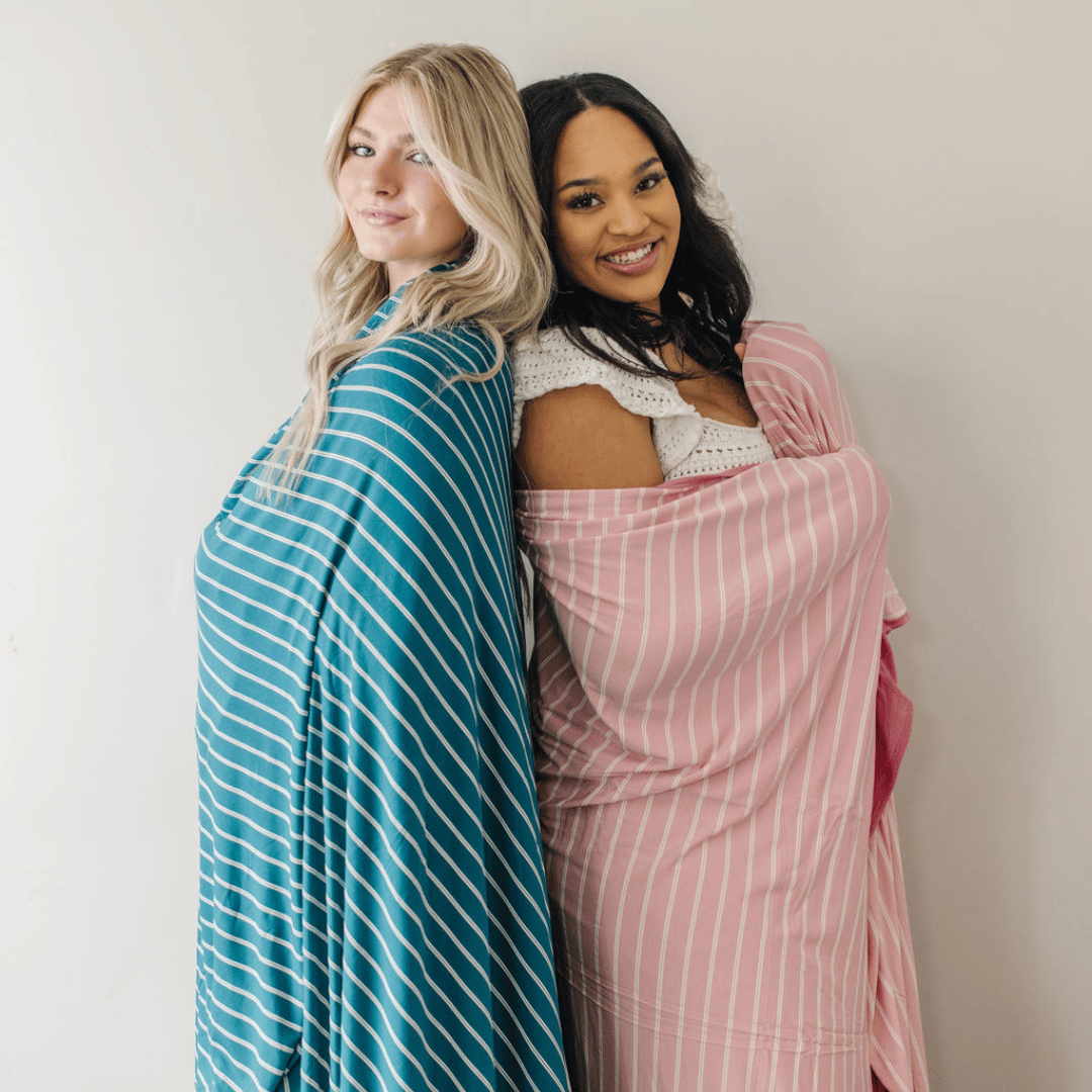 Large coquette pink and white striped blanket is the perfect addition to every household. From fires to picnics and back again, this jersey knit blend blanket is perfect for every occasion.