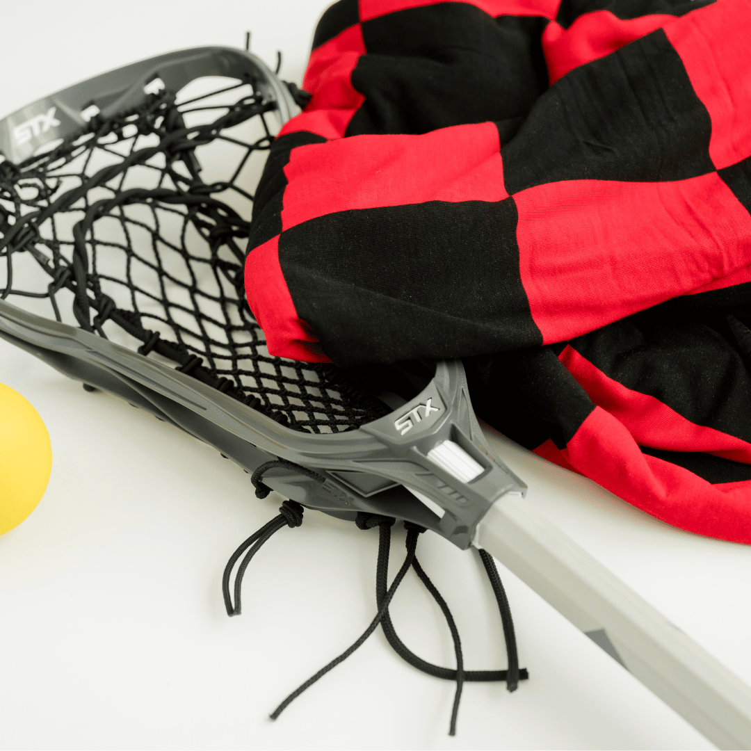 Stadium approved adult swaddle blanket, black and red checkered cozy lightweight blanket.
