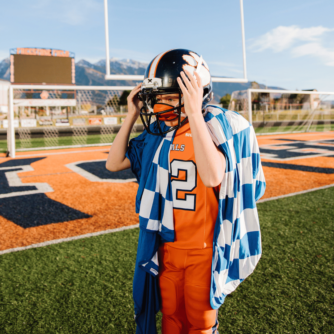 Modern checkered blue and white blanket to show your team pride.