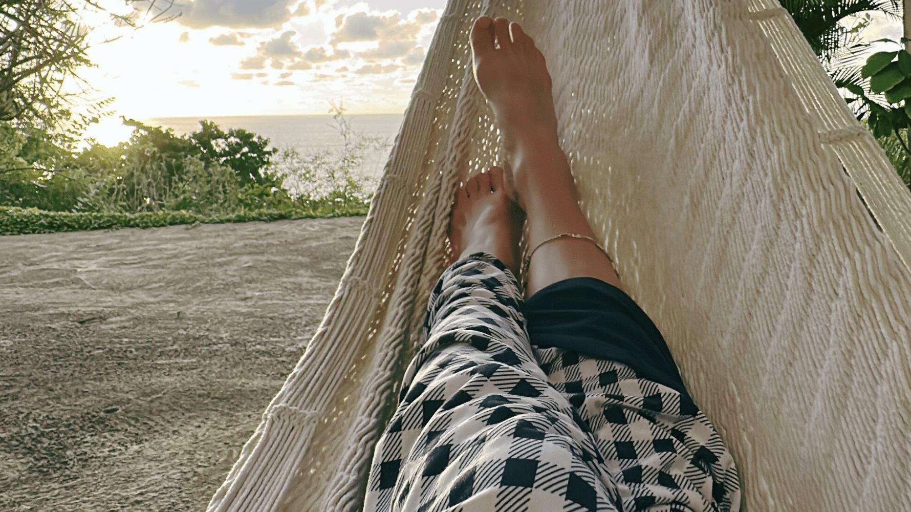 relaxing in hammock with Pipermoon blanket after being stung by a gusano quemador in Mexico