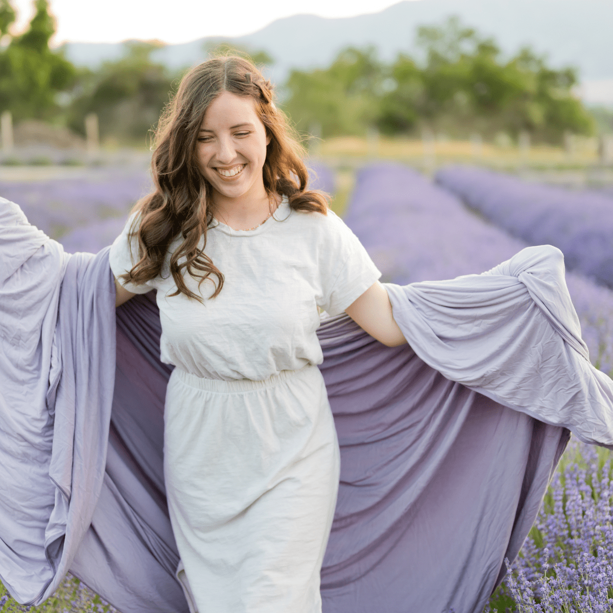 Oversized lavender hug blanket in two shades of calming soft purple.