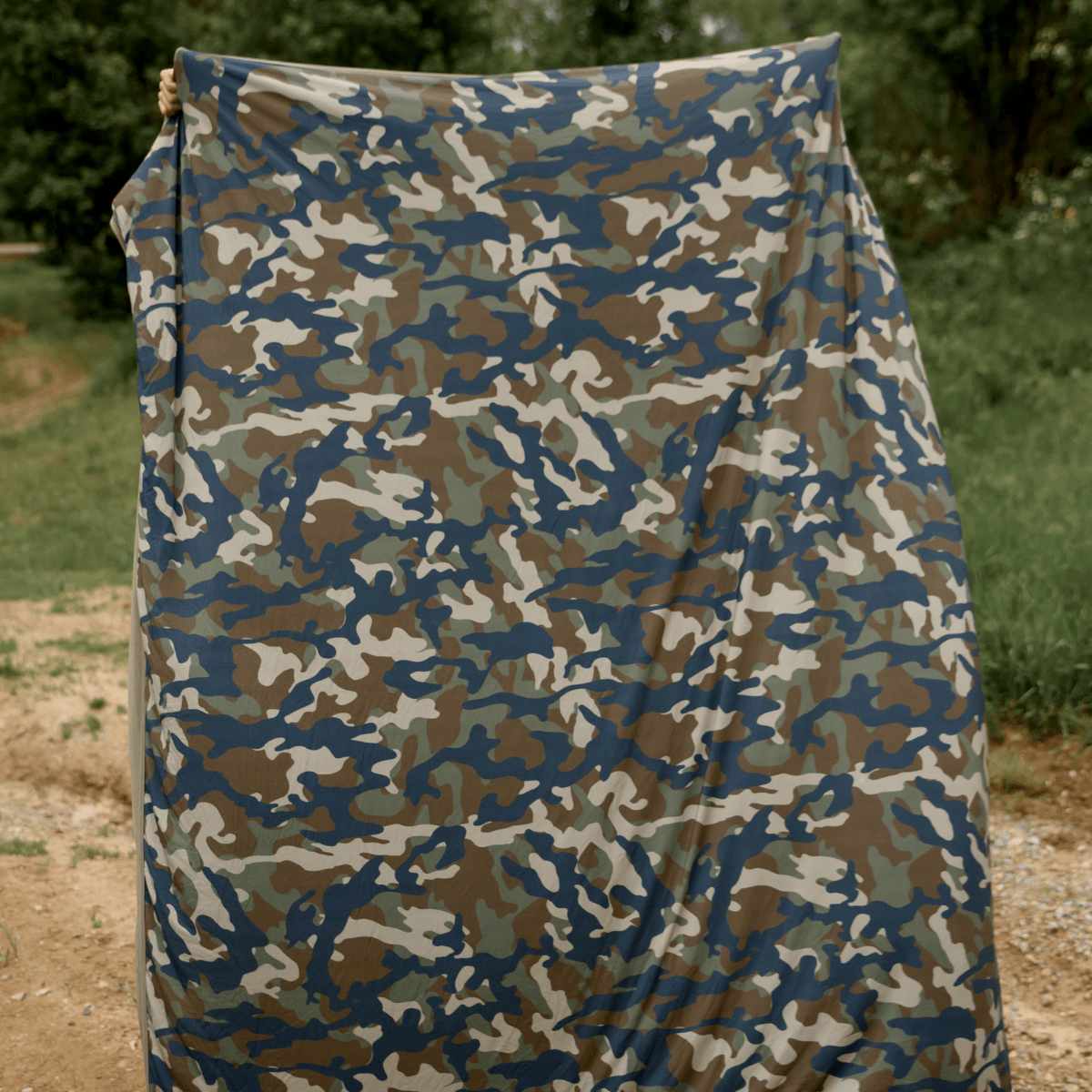 Camo print hug blanket that packs down super small making it easy to take on all your adventures