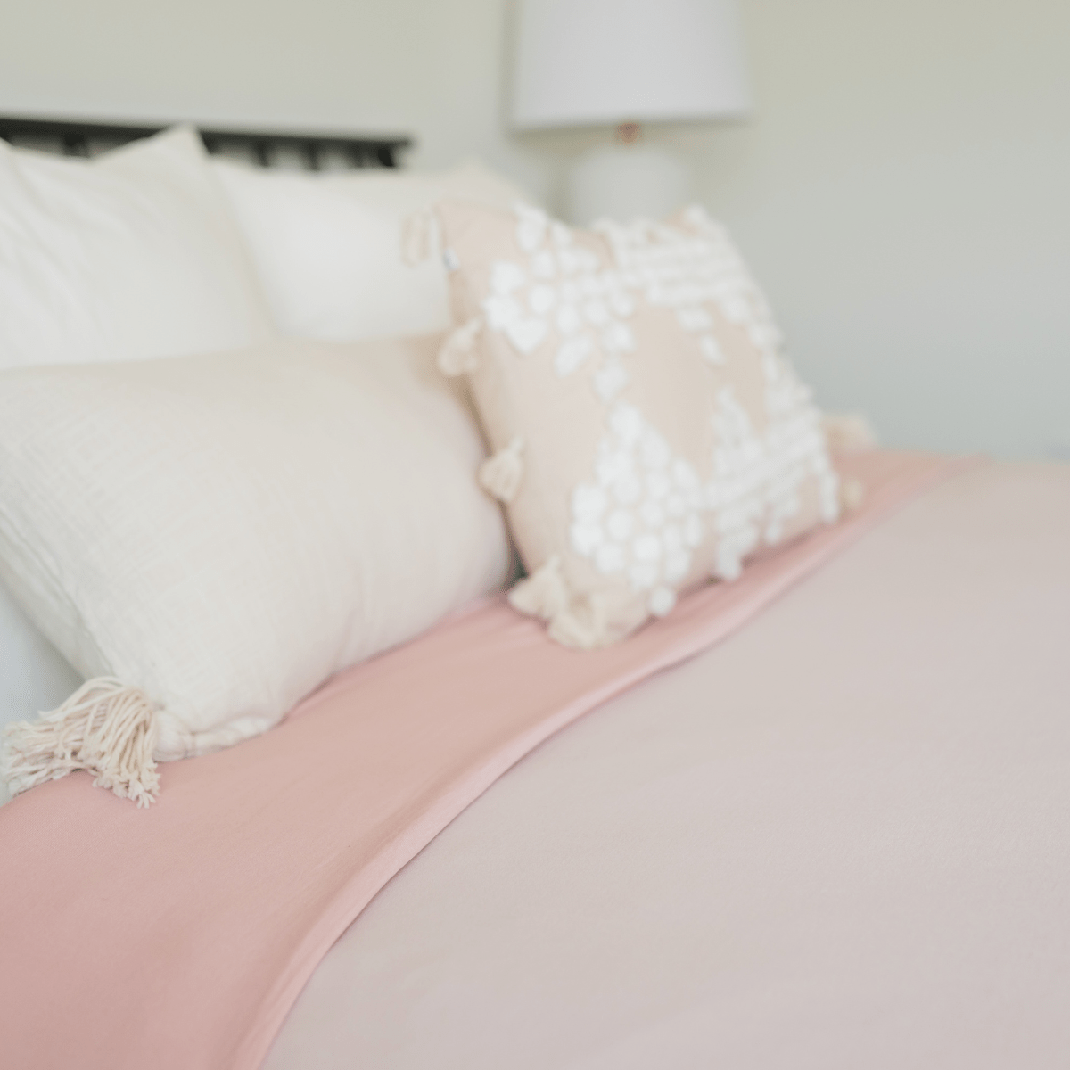 Blush pink bed blanket for better sleep. 