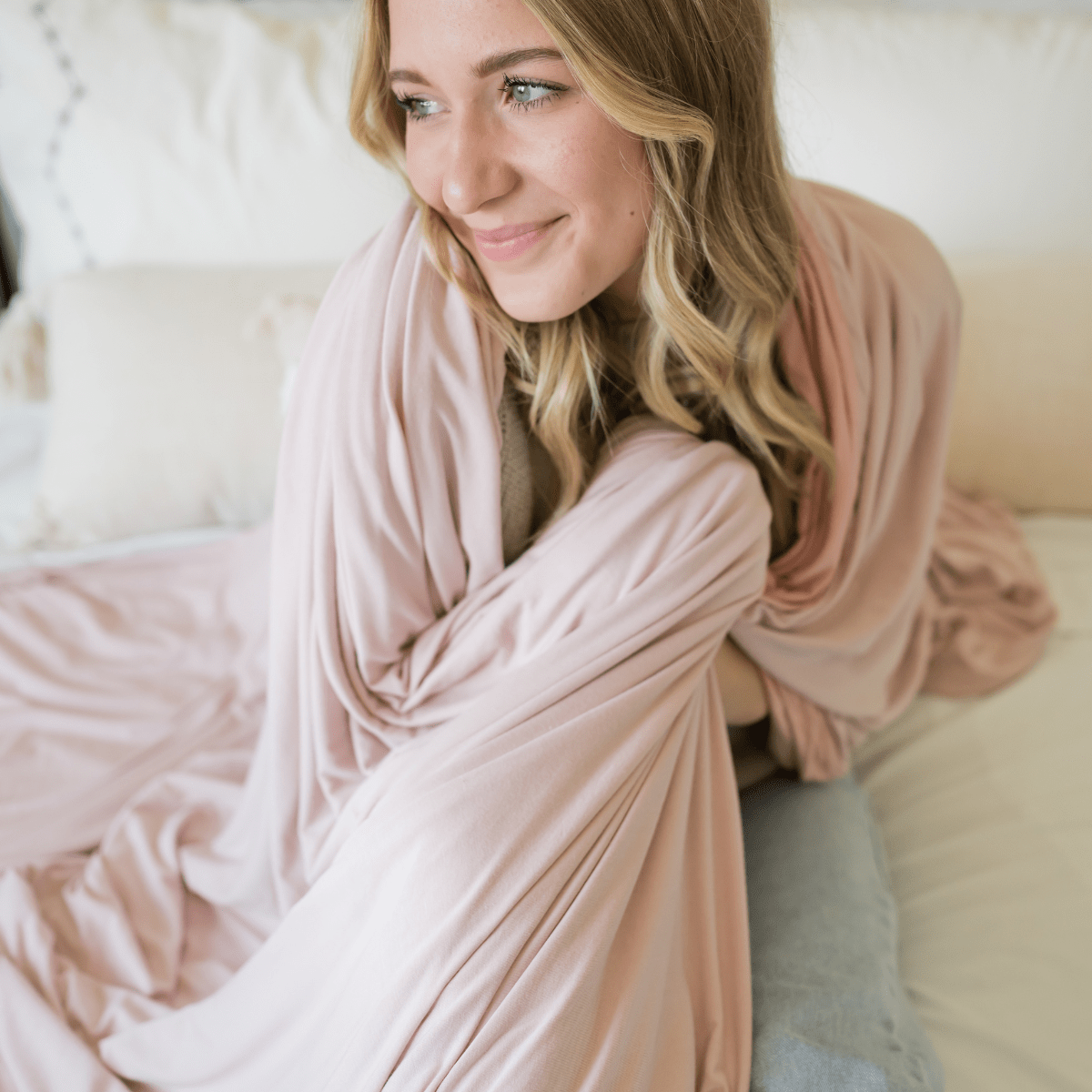 Our bed blankets are 2 layers of cozy material with the back size one shade darker of blush pink. 