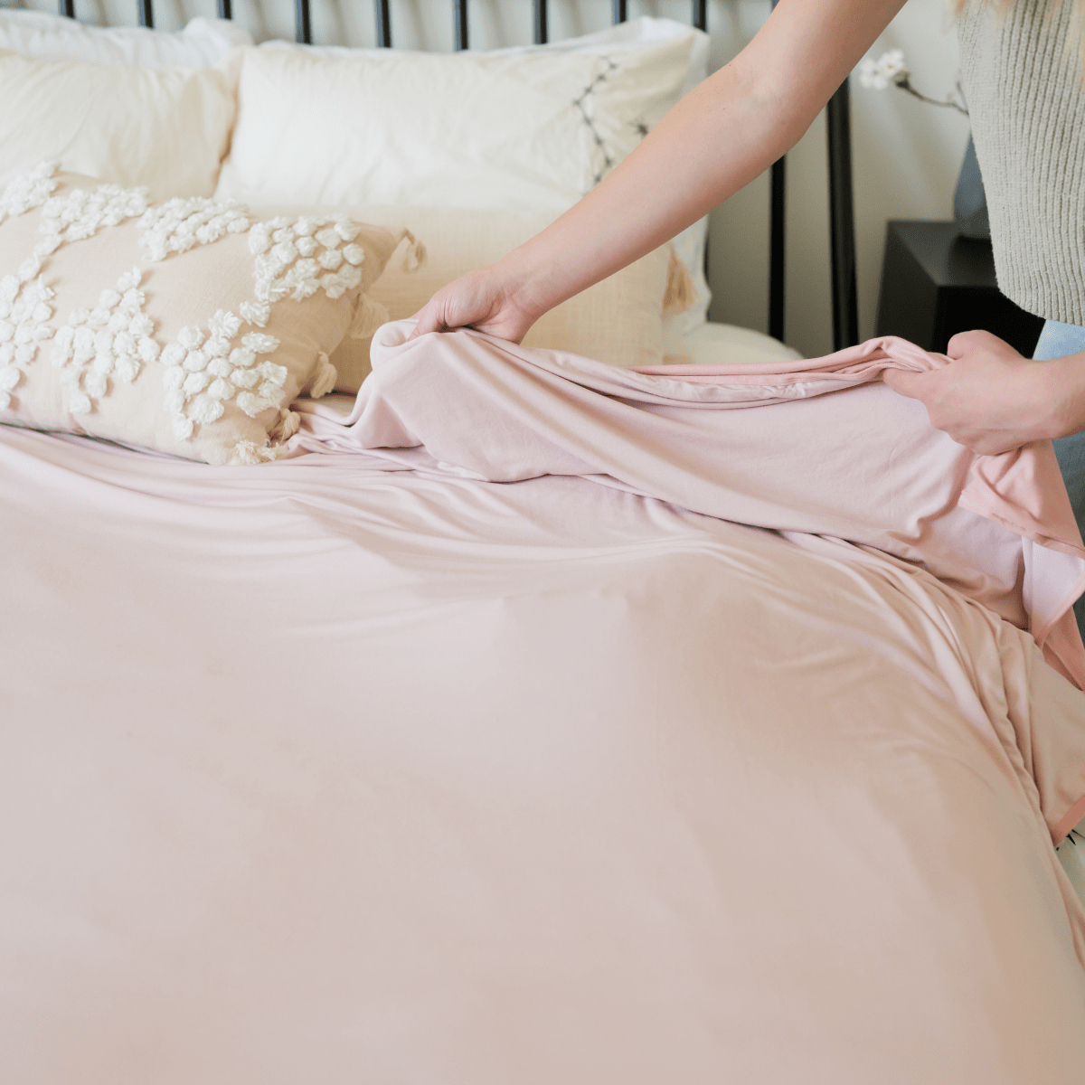 Make your bed extra cozy with our Blush pink bed blanket.