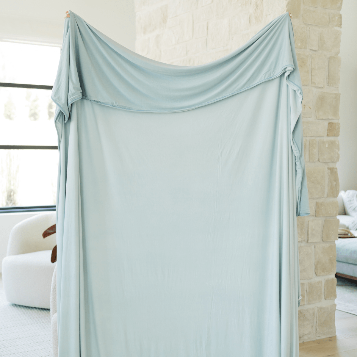 Two toned, sea glass powder blue on one side and a shade darker on the back.  Two layers of material for the best blanket hugs. 