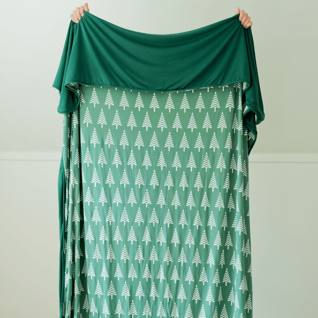 Cozy aesthetic green super cozy blanket packable for travel mountain lover mountain girl. 