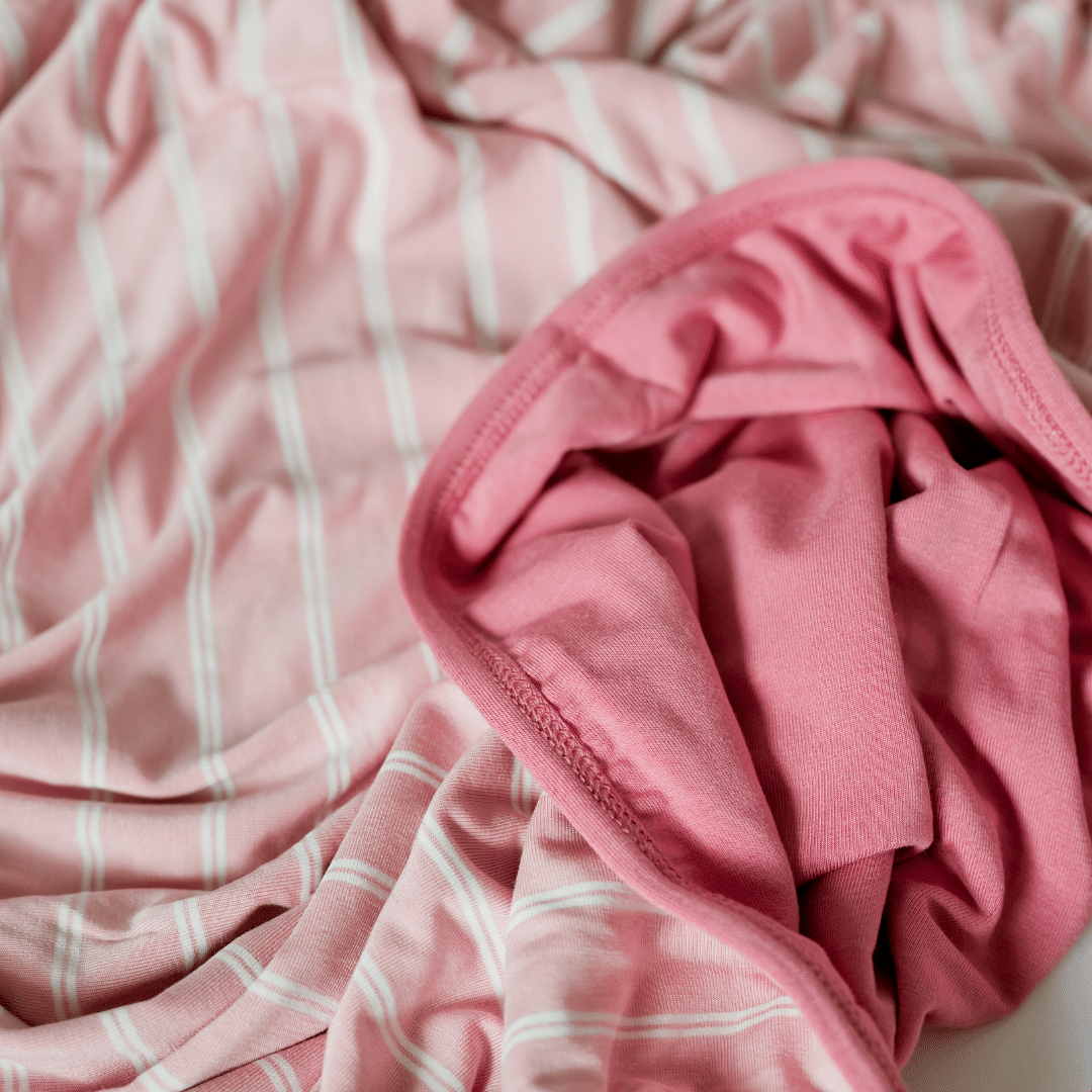 Luxurious isle pink delight cozy warm travel approved blanket.