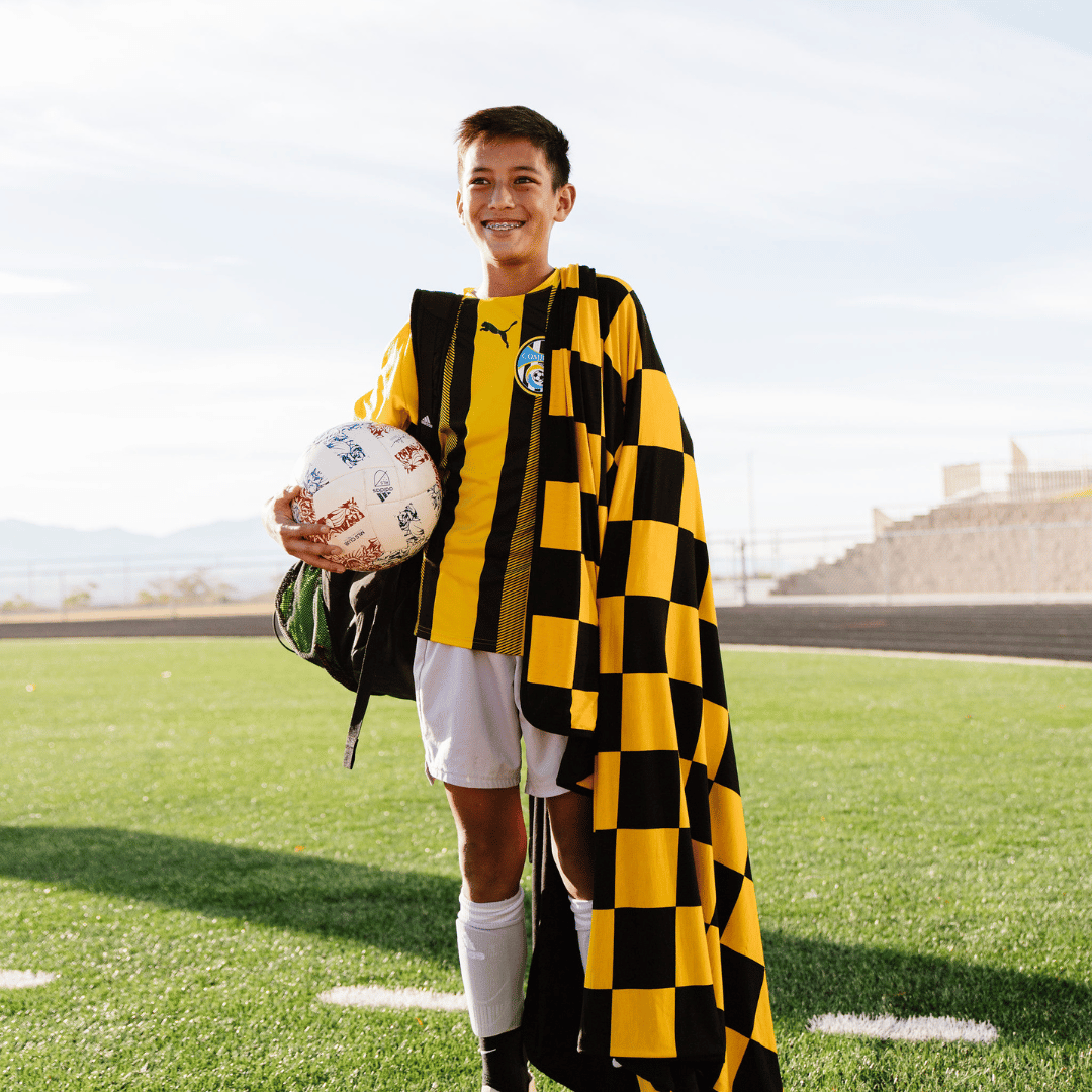 Black and yellow fan blanket for kids sports and adult watch parties.