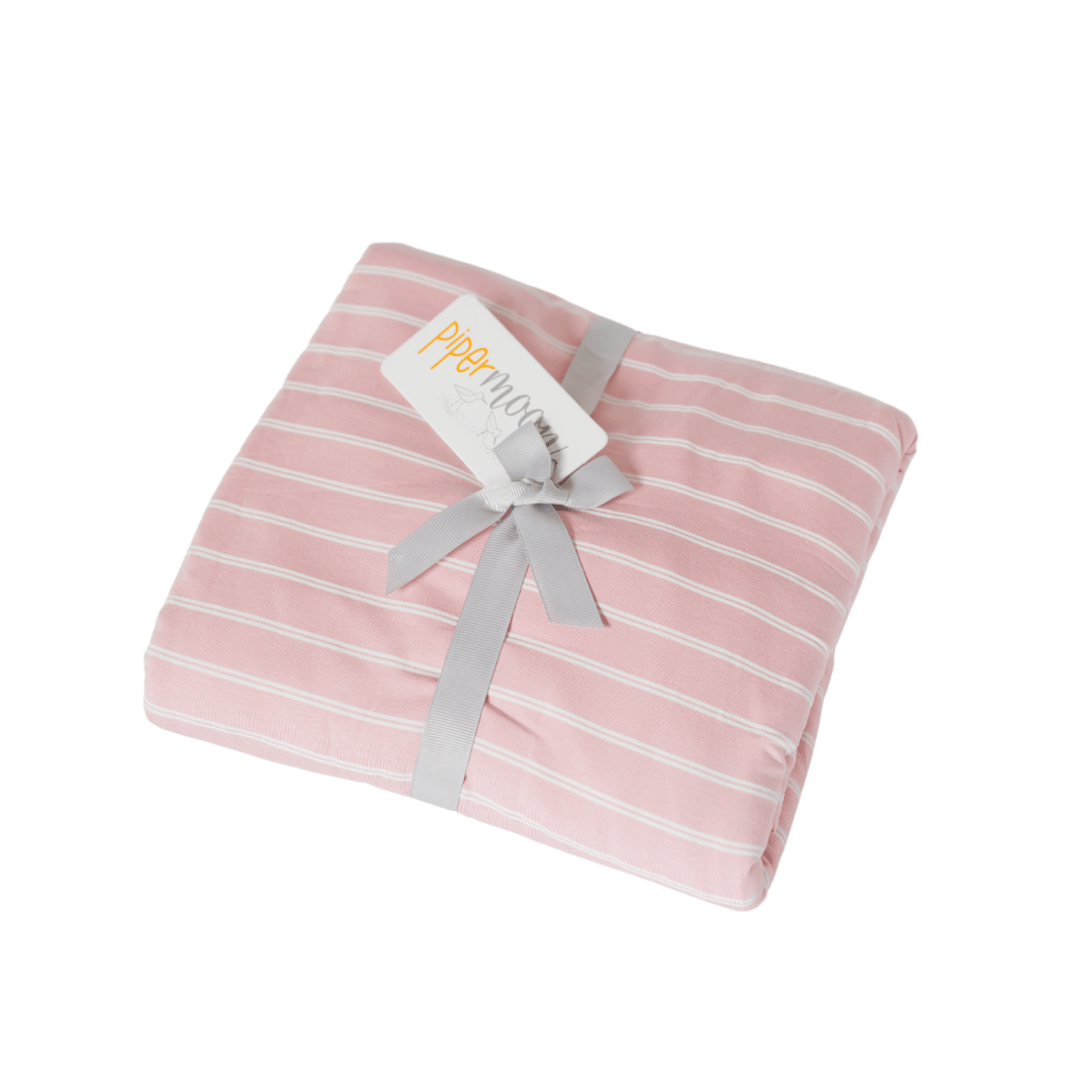 Blush pink boho light weight blanket for cute cozy aesthetic.